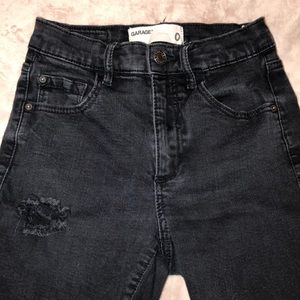 Distressed Black Mid-Rise Jeans